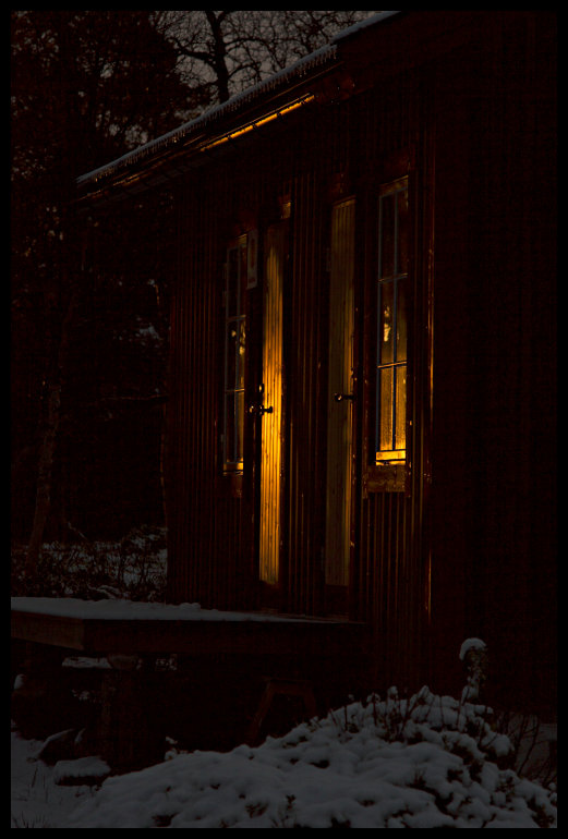 Východ slunce u chaty Rogenstugan.