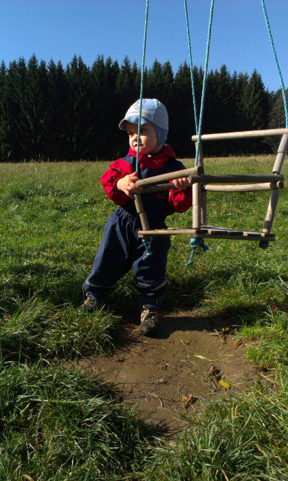 Obleček pro válení se v mokré trávě